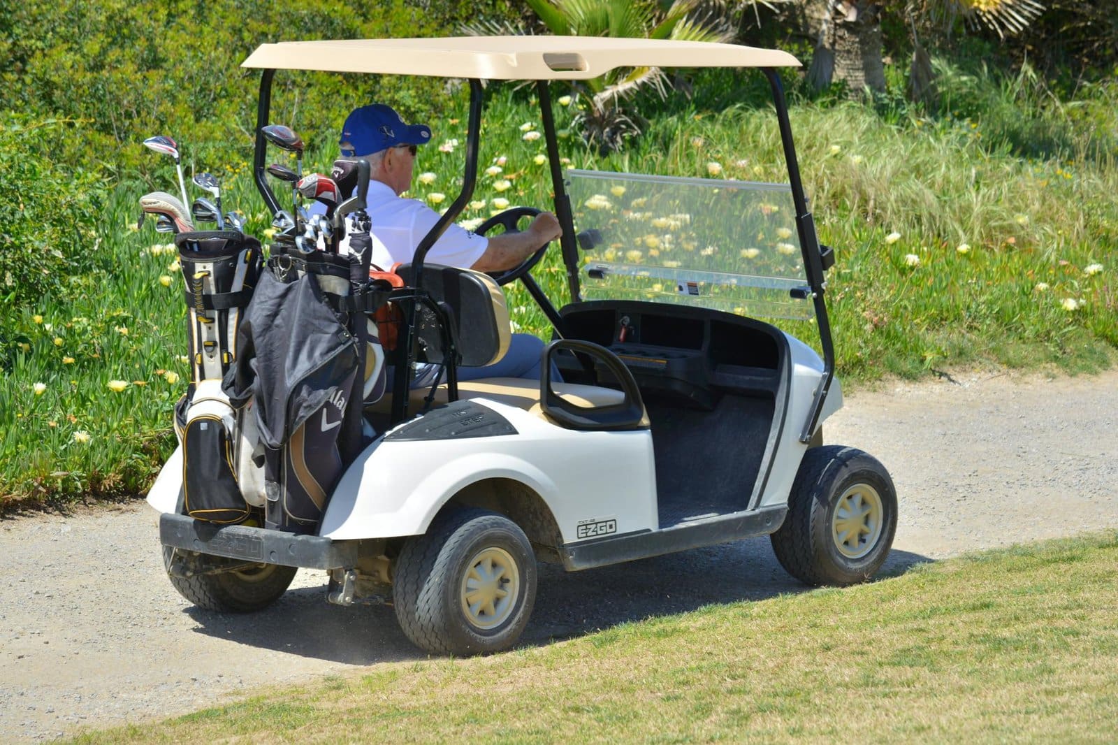 Golf cart or car on golf course.